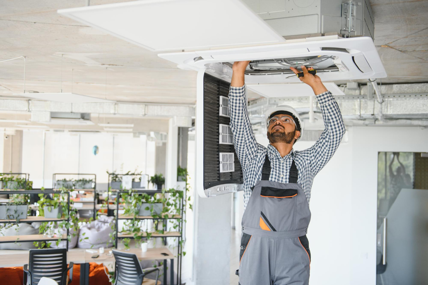 Technician installing AC